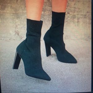 Black heeled booties (calf-sock boots)